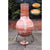 Back View On Gardeco Large Sol Mexican Chiminea In Rustic Orange With Burning Logs Inside | SKU: C21SL.37 | Barcode: 5031599045481