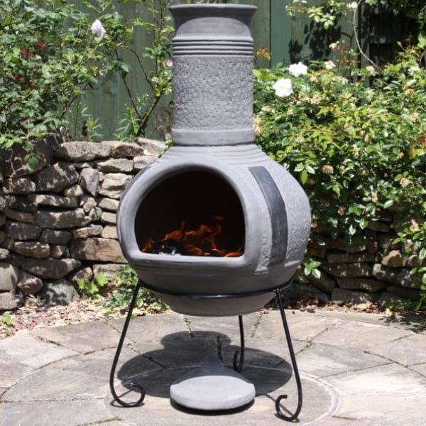 Gardeco Linea XL Mexican Chimenea In Grey In A Sunny Garden Setting | SKU: C6L.46 | Barcode: 5031599047362