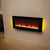 FLARE 38" Amari Wall Mounted Electric Fire With Orange Back Lighting In A Room Setting